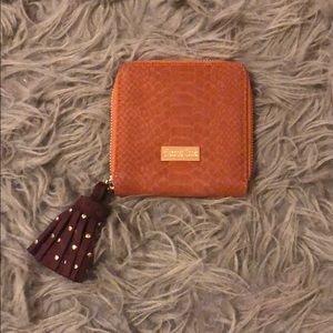 Snake skin pattern wallet w/ maroon zipper tassel